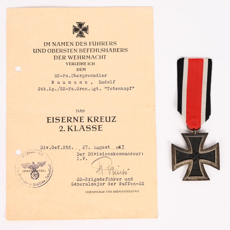WWII NAZI GERMAN SS PANZER EKII & AWARD DOCUMENT: A WWII Nazi German Iron Cross 2nd Class with Document was Awarded to SS Panzer Obergrenadier Rudolf Naumann of Stb.Kp./SS-Pz.Gren. Rgt. Totenkopf was awarded on August 27th 1943. The document was sign