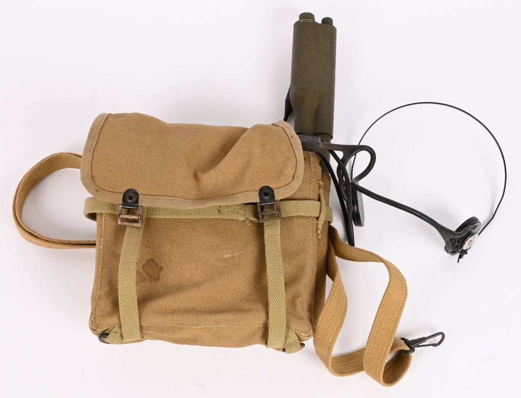 WWII PARAMARINE MAB PORTABLE AND MOBILE RADIO WW2: This Radio is as rare as hen's teeth and yes it is complete and unissued! The U.S. Navy MAB was a typical chest mounted "walkie-talkie" used during WWII. It was designed prior to the Handie-Talkie for