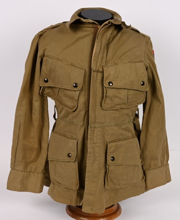 WWII NAMED 82ND AIRBORNE M42 JUMP JACKET WW2: This Original M1942 Airborne Jump jacket in Olive Drab #3 offered in excellent condition that is identified to a member of the 82md Airborne Division. The coat consists of four front patch