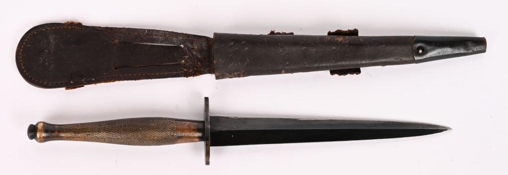 WWII BRITISH SYKES FAIRBAIRN FIGHTING KNIFE WW2: Scarce 2nd model Sykes Fairbairn World War II British commando knife stiletto in excellent condition. The blade itself is excellent with 95% blueing. Crossguard is marked Broad Arrow B2 and ENGLAND. T