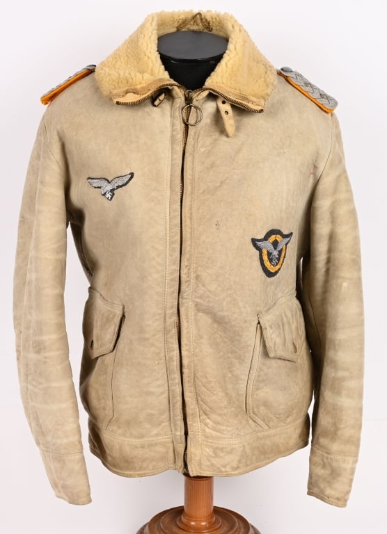 WWII NAZI GERMAN LUFTWAFFE LEATHER FLIGHT JACKET: Attractive Shearling Leather Flight Jacket with a zipped front with a lay down collar. To the breast is a nice quality, hand embroidered, second pattern, (Circa 1936/1937-1945), Luftwaffe eagle, with