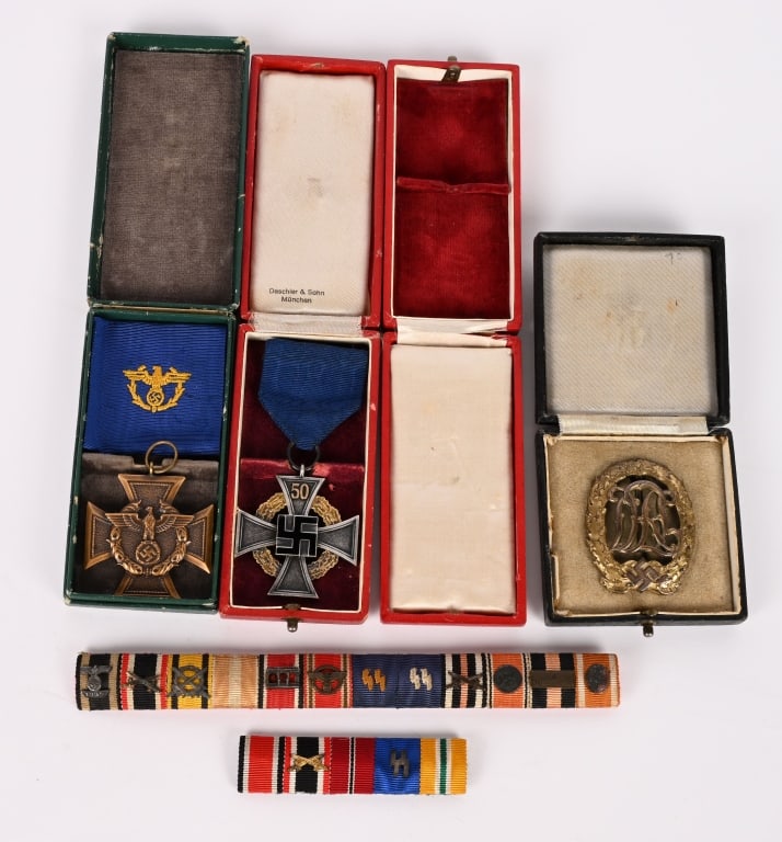 WWII NAZI GERMAN MEDAL LOT CUSTOMS DRL 50 NSDAP: Lot of German Medals to include 1) CUSTOMS/BORDER SECURITY LONG SERVICE DECORATION CASED. Die struck, tombac/brass alloy construction award with a bronze wash is in the form of a