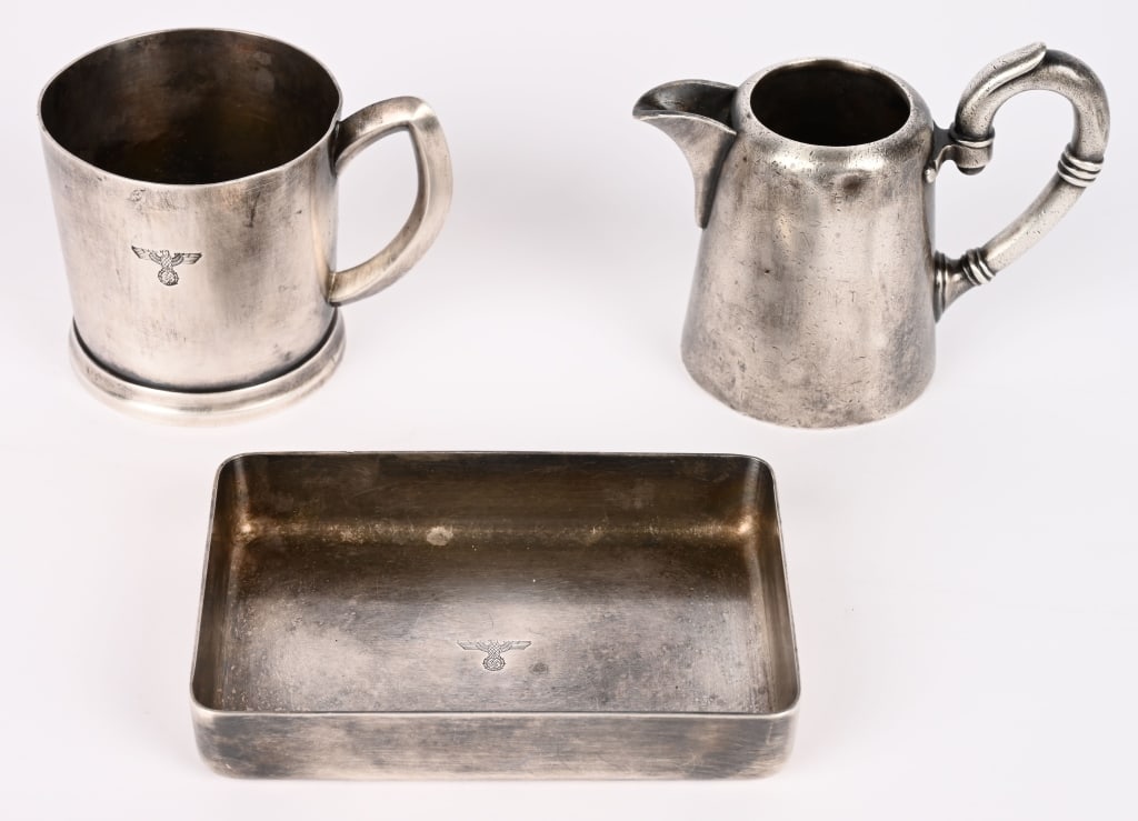WWII NAZI GERMAN HOTEL BERCHTESGADEN SERVICE LOT: Lot of three Silver Service pieces from the Hotel Berchtesgaden to include 1) Small Silvered tray measuring 4 3/4 X 3 1/8 inches that is marked with a Political Eagle to the interior. The reverse is