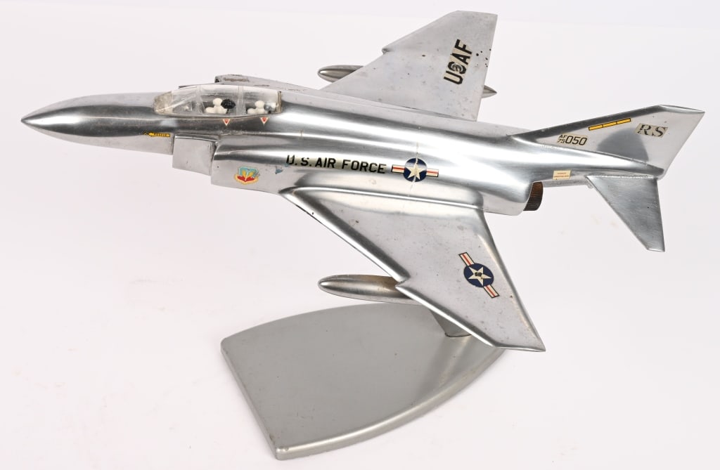 MCDONNELL DOUGLAS F-4 PHANTOM AIRCRAFT MODEL FDM: Polished aluminum F-4 Phantom Aircraft Model by FDM and is made in Italy with a wingspan of 8 3/4 inches. Excellent. The McDonnell Douglas F-4 Phantom II is an American tandem two-seat,