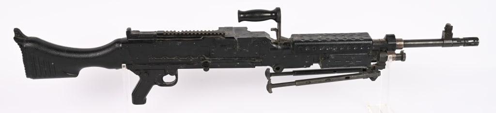 SOLID FN M240B MATTE BLACK TRAINING PROP: This 1:1 scale M240B machine gun replica is a solid-cast, non-firing tactical training aid featuring a non-reflective matte black finish that replicates the look of a military-issue service weapon.