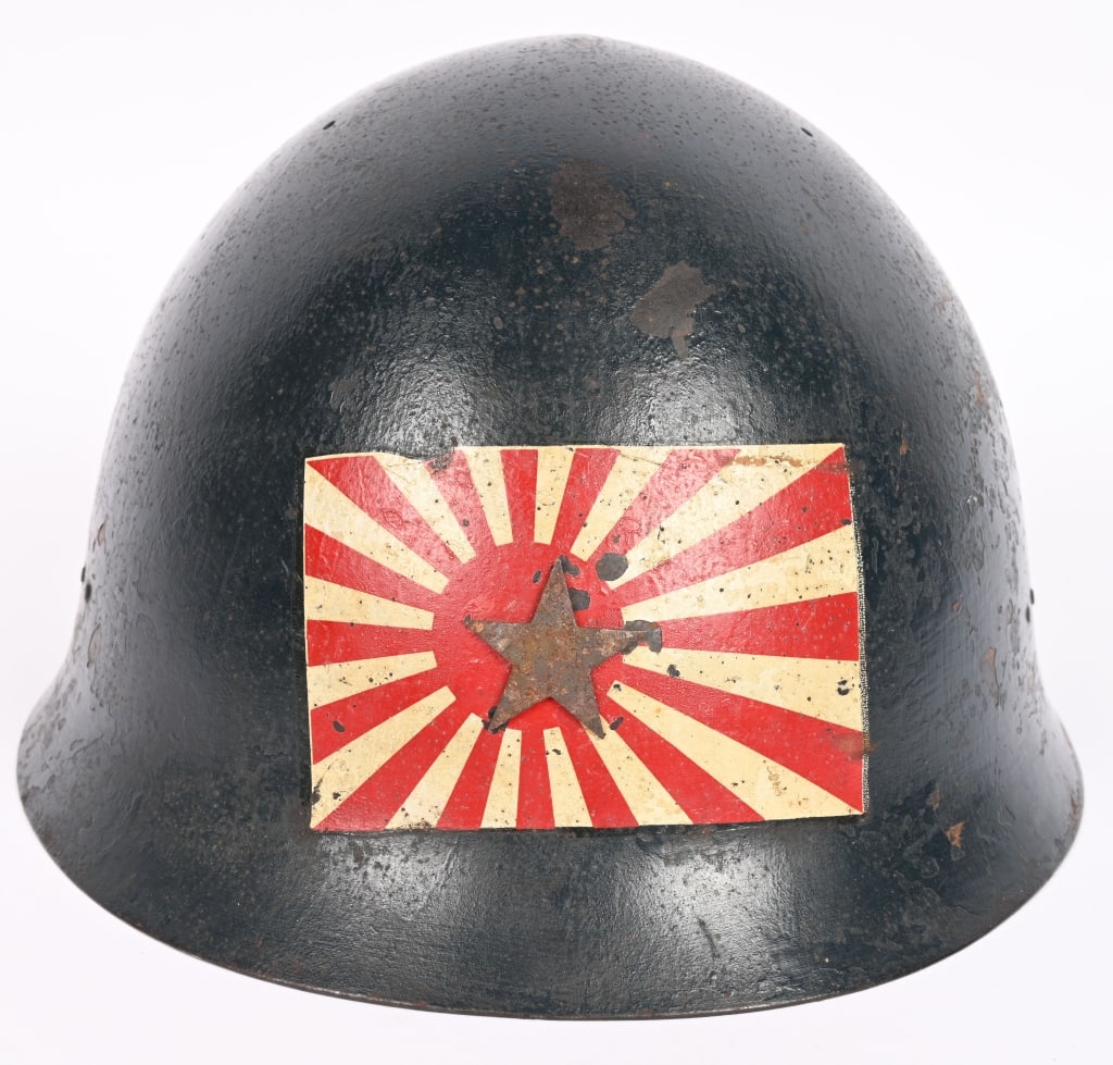 WWII IMPERIAL JAPANESE TYPE 90 COMBAT HELMET WW2: The standard WWII Japanese infantry combat helmet. The shell constructed from chrome molybend steel shows loads of period wear and combat use. The original IJA metal star is present. There is a Rising