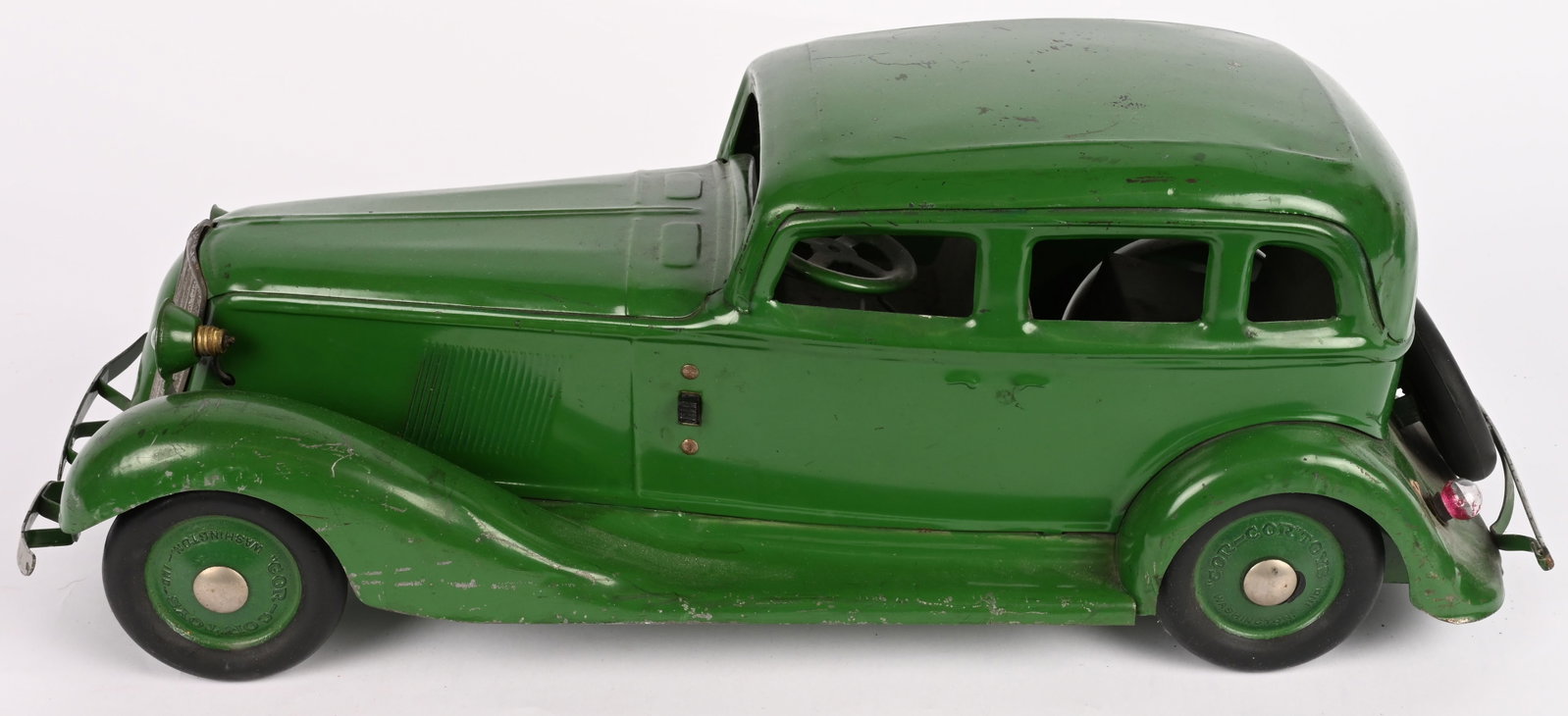 COR COR GRAHAM SEDAN DELUXE w/ ELECTRIC LIGHTS: Nice original Cor Cor Graham. Deluxe version with electric head lights and tail light. Unusual green color. Beautiful original paint. A very nice example. 20" Excellent