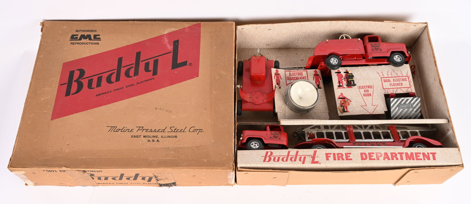 BUDDY L #5071 FIRE DEPARTMENT w/ BOX: Buddy L #5071 Fire Department. Set includes GMC Fire Ladder Truck, GMC Hose reel Truck, Search Light, and Accessories. Looks to be mostly complete. Nice original condition. Boxed with Inserts. 28"