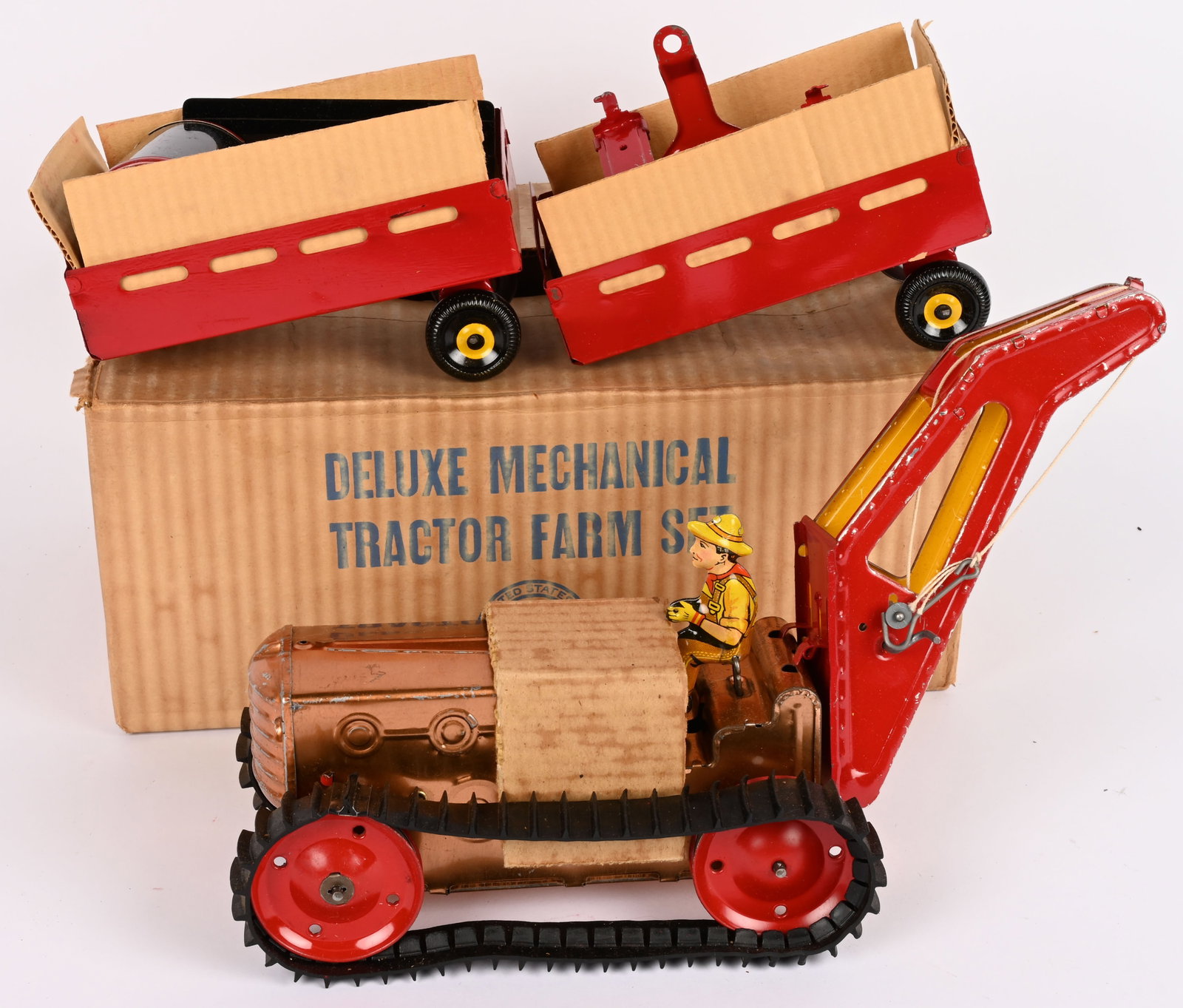 MARX DELUXE TRACTOR FARM SET w/ BOX: Marx Deluxe Tractor Farm Set. All original and looks never played with condition. Come with tin windup Tractor and Accessories. Boxed with Inserts. 15" Excellent