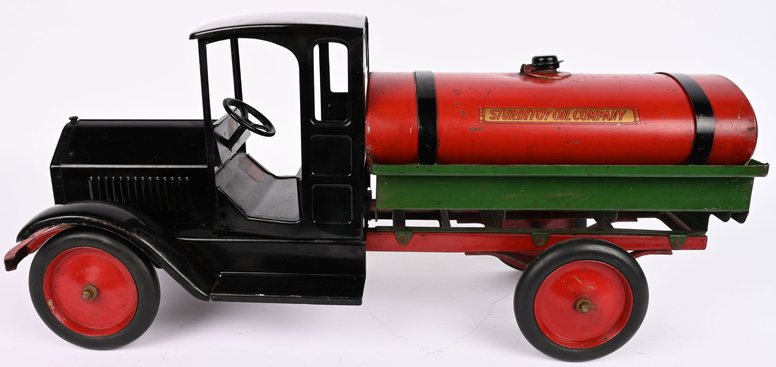 STURDITOY OIL COMPANY TANK TRUCK: Sturditoy pressed steel Oil Company Tank Truck. Super clean original with nice paint and decals. Some very minor wear to tank. Still has original spigot. A very nice truck. 27" Excellent