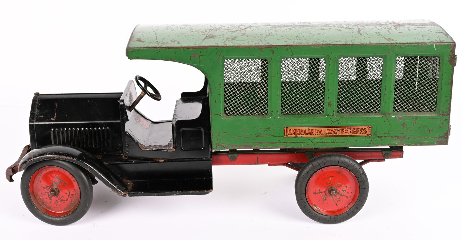 STURDITOY AMERICAN RAILWAY EXPRESS SCREEN SIDE: Sturditoy pressed steel American Railway Express Screen Side. Decent original and paint and decals. Rear door latch has been replaced. Front bumper has a bend. Displays well. 26' Very Good-Excellent