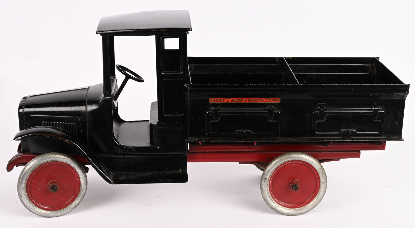 BUDDY L SAND & GRAVEL TRUCK: Buddy L pressed steel Sand & Gravel Truck. All original with exceptional paint and decals. A very high quality example. Bed divider has been replaced. 26" Excellent