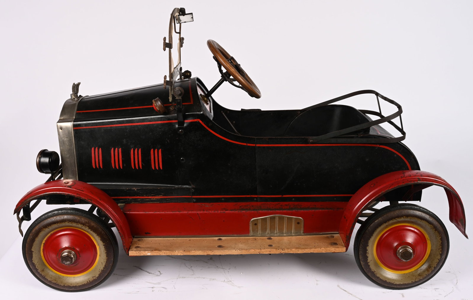 1920s GENDRON MARMON PEDAL CAR: 1920s Gendron Marmon Pedal Car. Outstanding original with exceptional paint and decals. Well appointed with accessories including windshield, cowl light, hood ornament, horn, spot light, and more. Ver