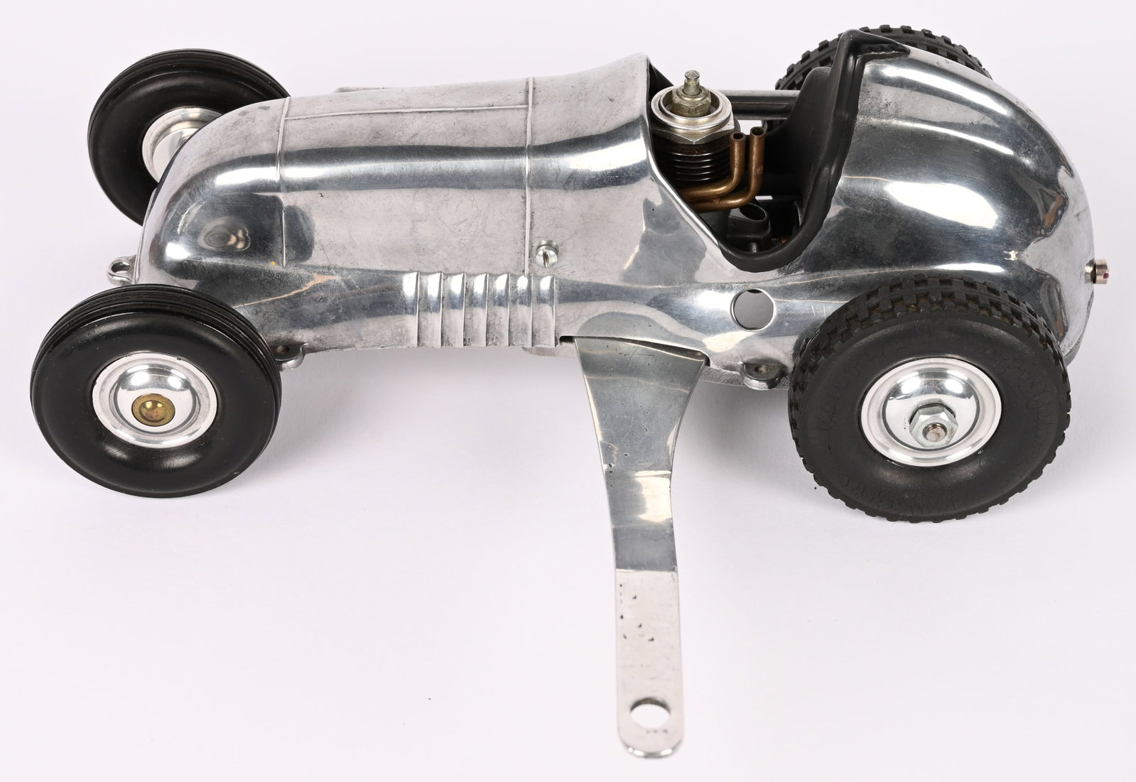 COX THIMBLE DROME SPECIAL CONVERSION TETHER CAR: Cox Thimble Drome Special Conversion Gas Powered Tether Car. With OK Cub .074 Engine, H.S. Briggs drive unit and engine mount. Custom pan handle. One of a kind racer that was acquired from the