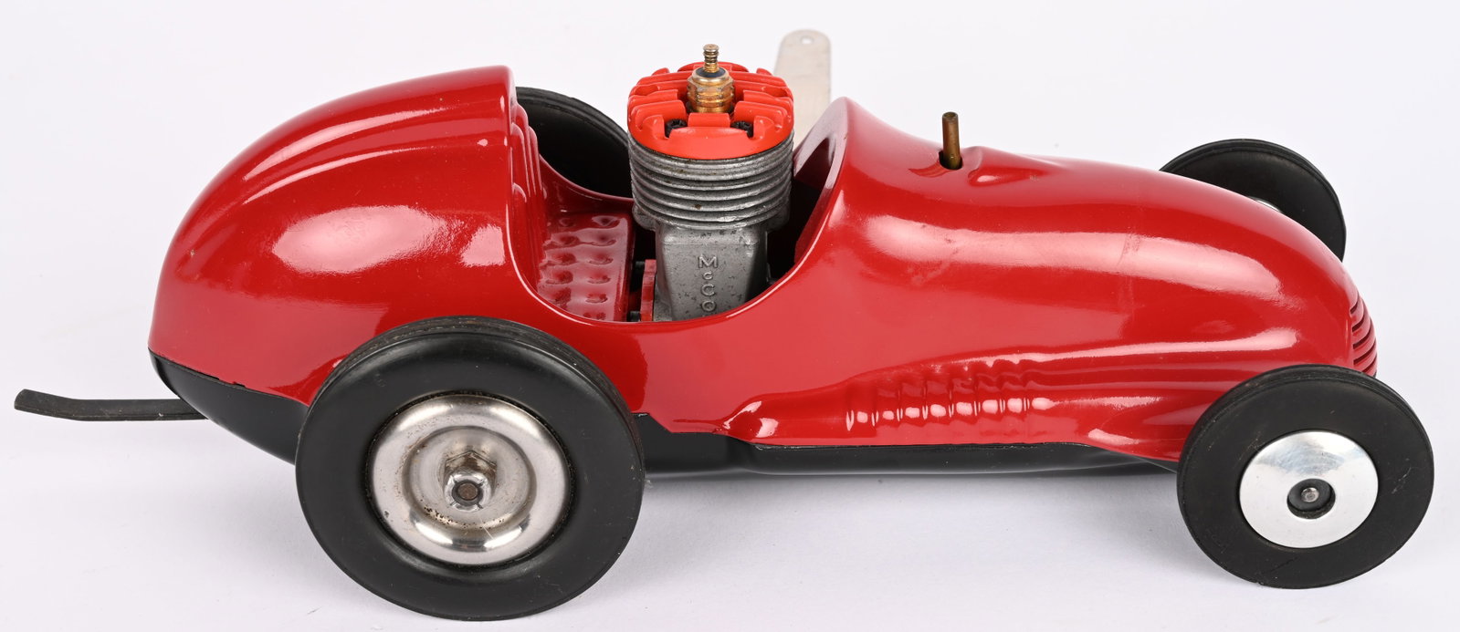 REAL MCCOY GAS POWERED TETHER RACE CAR: Real McCoy Gas Powered Tether Race Car. Restored condition. Has drive train with McCoy .19 Engine. Nice racer. 11" Excellent