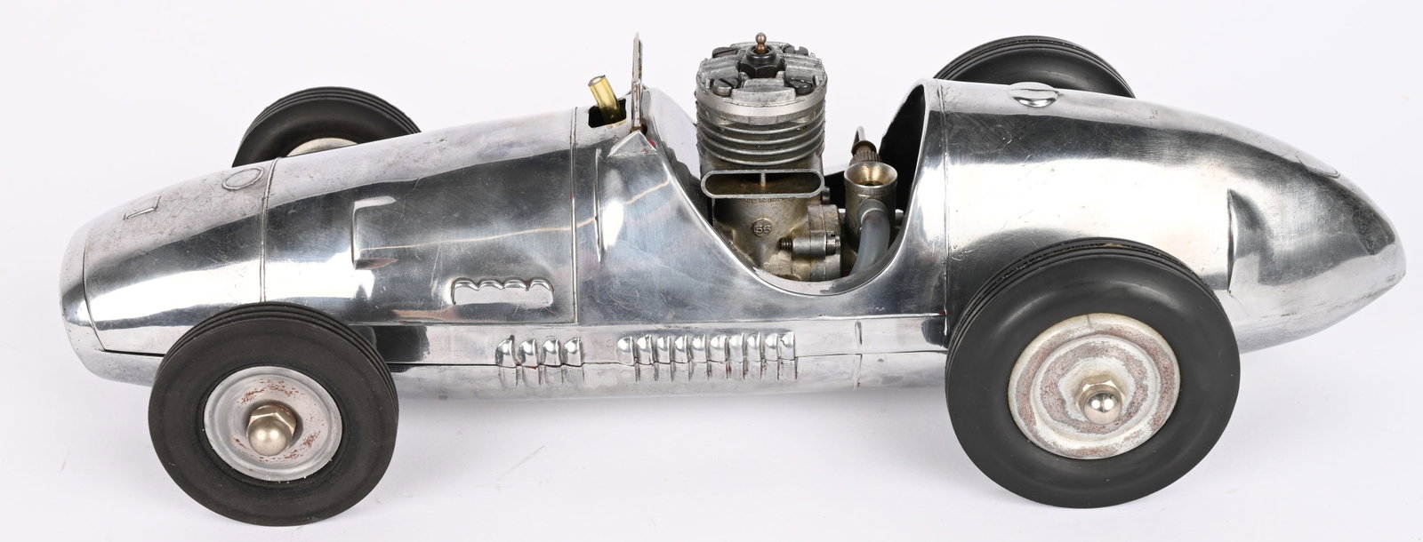 FERRARI MOVOSPRINT 52 GAS POWERED TETHER RACE CAR: Ferrari Movosprint 52 Gas Powered Tether Race Car. Made in Italy. Modeled after a classic Ferrari Racer. All original complete with drive train and engine. A very desirable gas powered racer. 12"