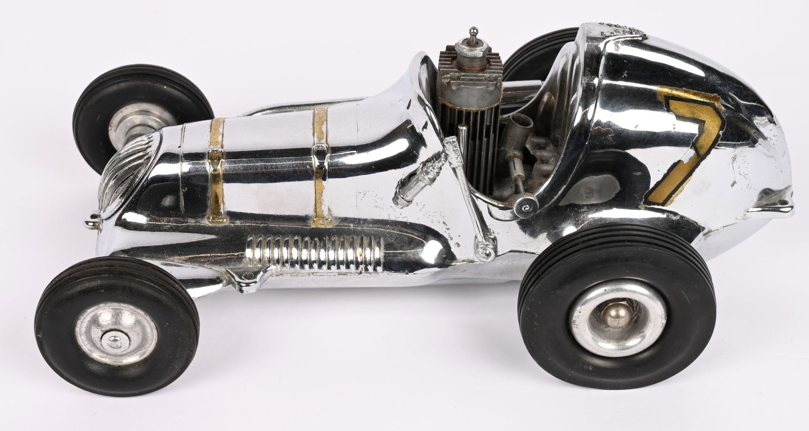 COX THIMBLE DROME CHAMPION GAS POWERED RACER: Roy Cox Thimble Drome Champion. Chrome finish. All original and complete with gas engine. 10" Excellent
