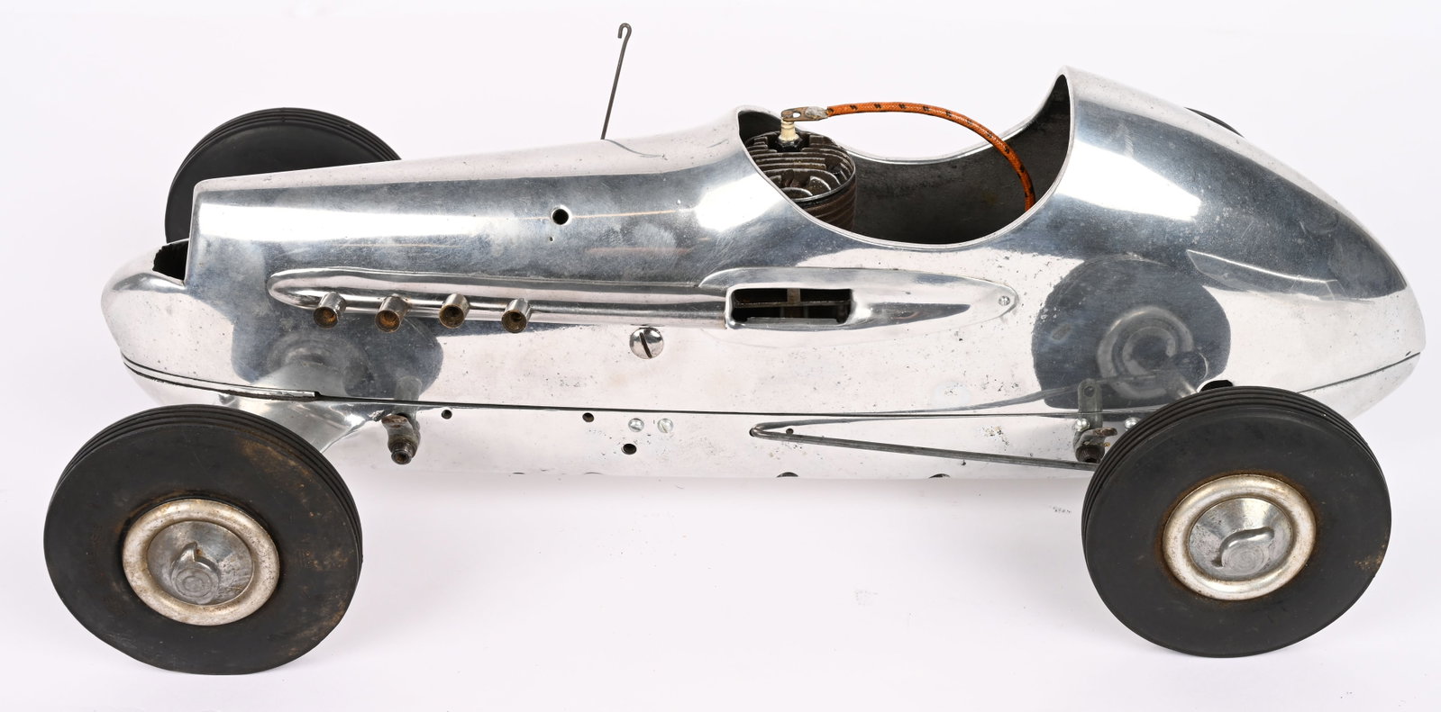 ALUMINUM GAS POWERED TETHER RACE CAR: Great looking Aluminum Gas Powered Tether Race Car. Complete with running gear and engine. Very unique design with nice details. Great looking racer. 17" Excellent