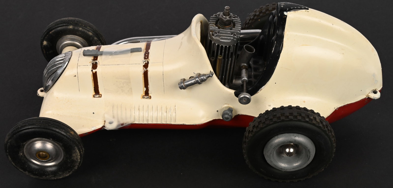 COX THIMBLE DROME CHAMPION GAS POWERED RACER: Roy Cox Thimble Drome Champion. All original and complete with gas engine. Has broken brake handle. 10" Excellent