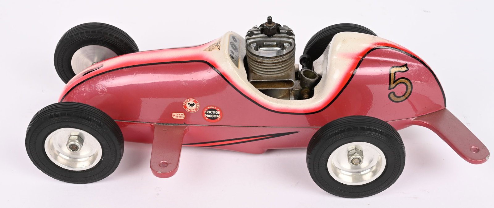 BUTCH MILLER MITE GAS POWERED TETHER CAR: Butch Miller Mite Gas Powered Tether Race Car. Great looking car in very nice condition. Has running gear with McCoy Engine. Bottom has some marks in paint. 11" Excellent