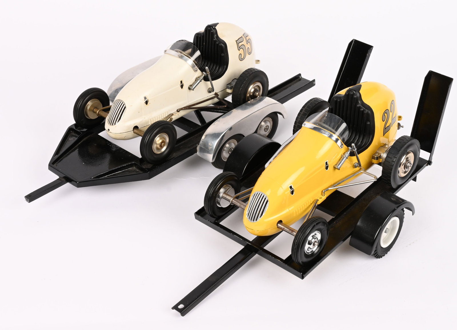 2- OHLSSON & RICE TETHER RACE CARS: Nice pair of Ohlsson & Rice Tether Cars. Both with no drive trains. Both in great shape. Comes with 2 custom car trailers. 10" Excellent