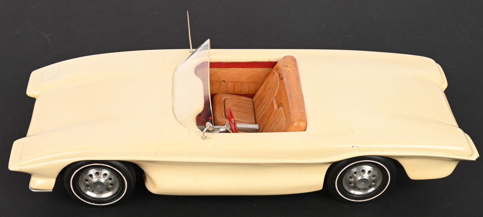 FISHER BODY CRAFTSMAN GUILD STYLING MODEL CAR: Outstanding 1960s Fisher Body Craftsman Guild Styling Model Car. Wonderful hand built wooden model futuristic convertible. Very nice details. Has original paperwork on bottom of the car describing