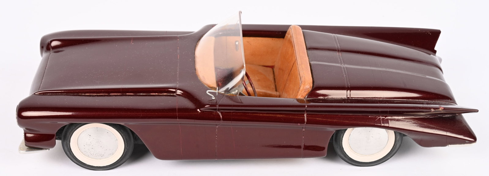 FISHER BODY CRAFTSMAN GUILD STYLING MODEL CAR: Outstanding 1960s Fisher Body Craftsman Guild Styling Model Car. Wonderful hand built wooden model futuristic convertible. Very nice details. Has original paperwork on bottom of the car describing