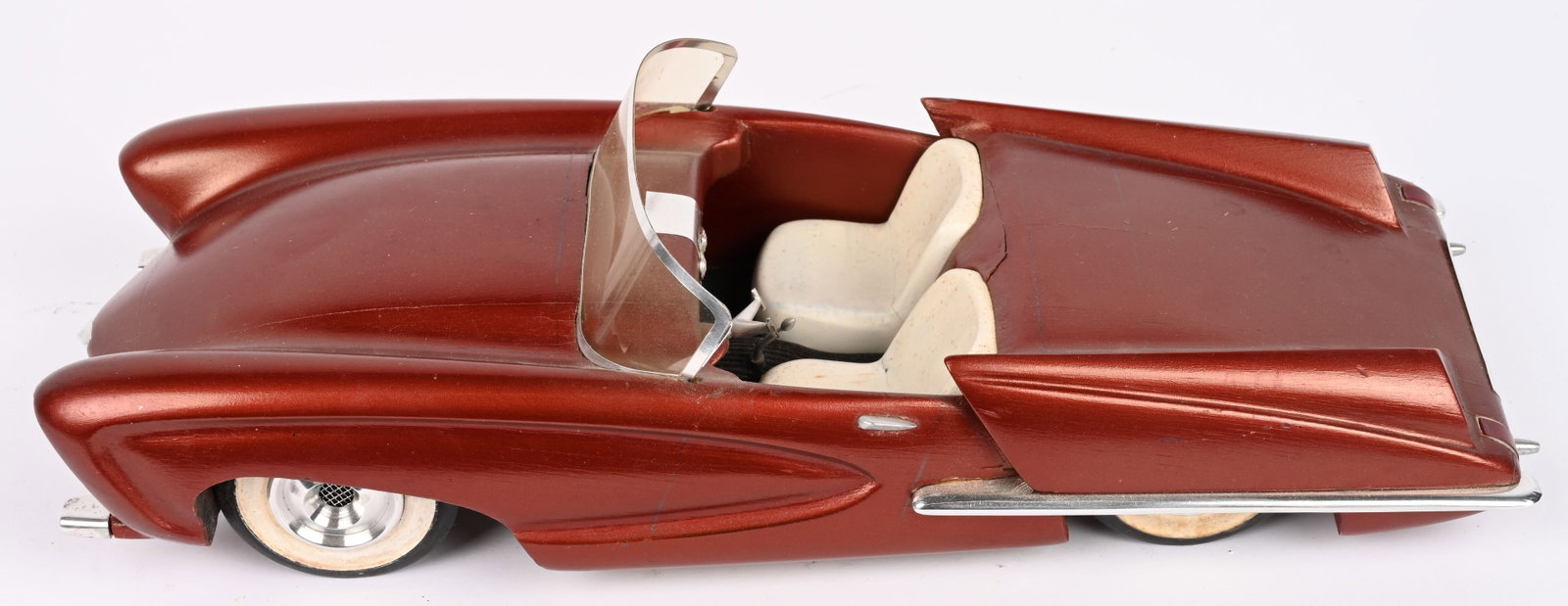 FISHER BODY CRAFTSMAN GUILD STYLING MODEL CAR: Outstanding 1960s Fisher Body Craftsman Guild Styling Model Car. Wonderful hand built wooden model futuristic convertible. Very nice details. A rare and wonderful piece of automotive history. 14"