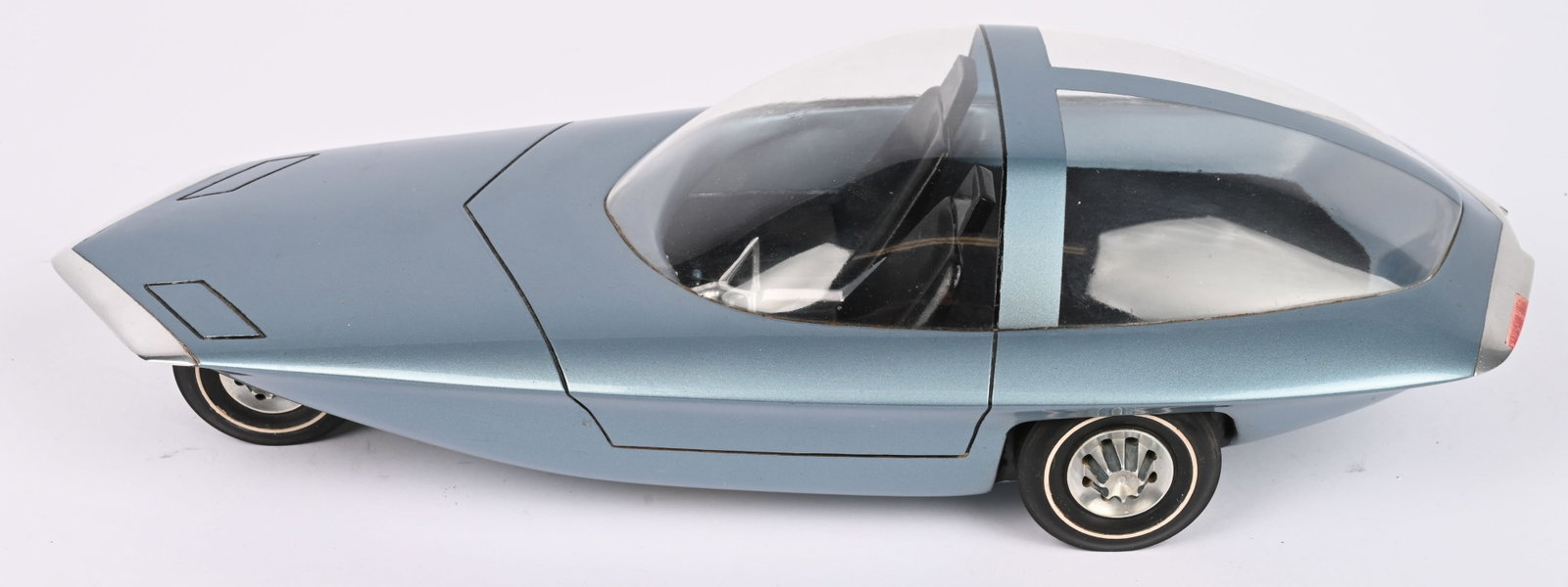 FISHER BODY CRAFTSMAN GUILD STYLING MODEL CAR: Outstanding 1960s Fisher Body Craftsman Guild Styling Model Car. Wonderful hand built wooden model futuristic bubble top car. Very nice details. A rare and wonderful piece of automotive history. 14"