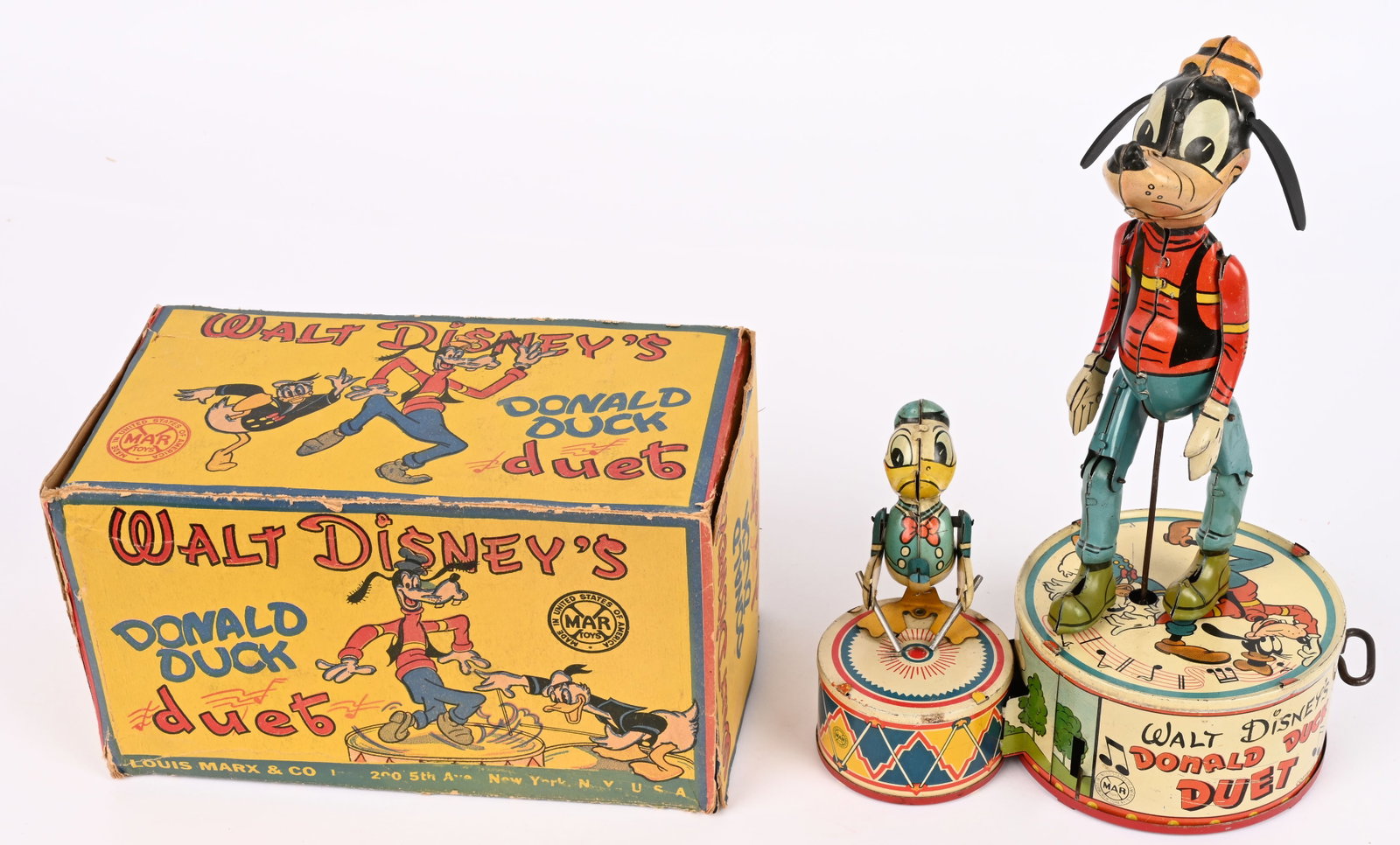 MARX TIN WINDUP DONALD DUCK DUET w/ BOX: Marx tin windup Donald Duck Duet. All original and complete. has very nice colors and Disney graphics. Windup works. Boxed 8" Excellent