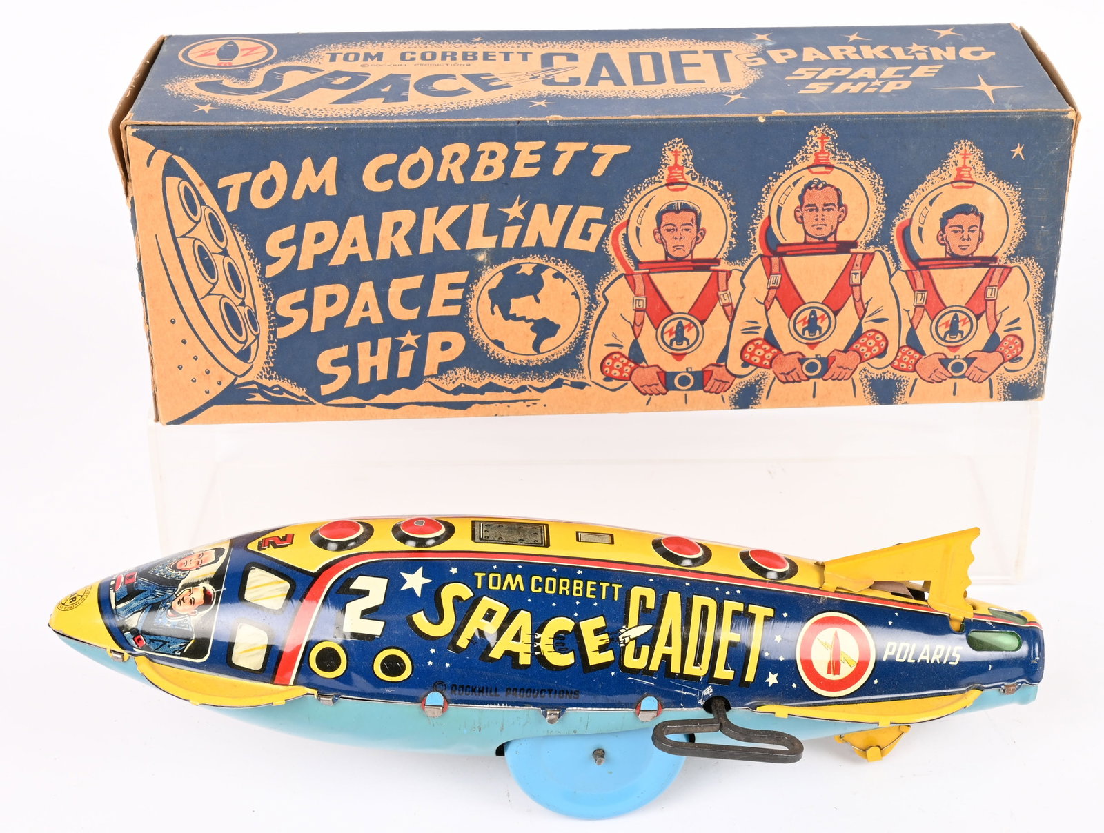 MARX WINDUP TOM CORBETT SPARKLING SPACE SHIP wBOX: Marx tin windup Tom Corbett Space cadet Sparkling Space Ship. All original and looks never played with condition. Colors are very nice. Still has original tail fin. Windup works. Boxed 12" Excellent