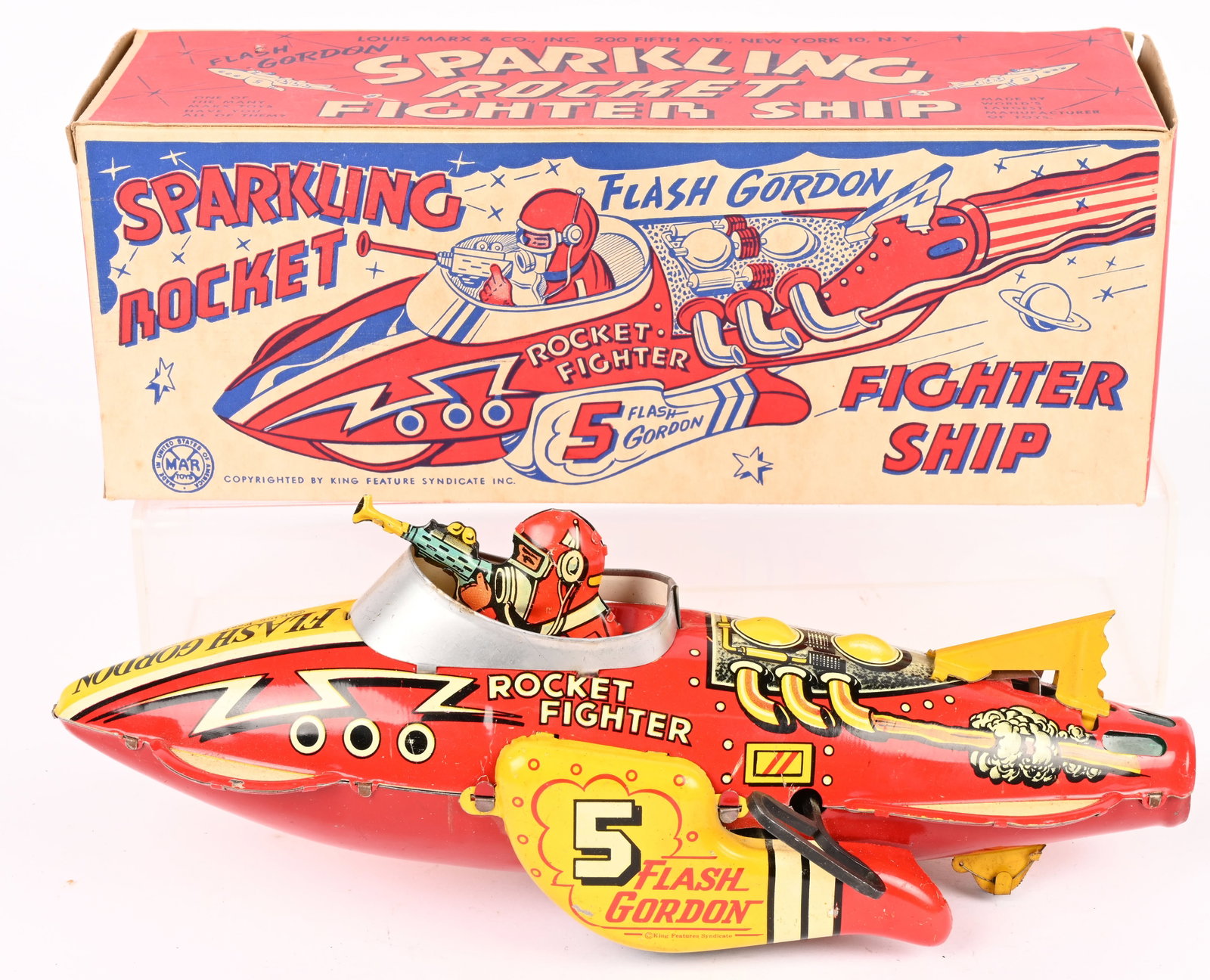 MARX WINDUP FLASH GORDON ROCKET FIGHTER SHIP wBOX: Marx tin windup Flash Gordon Sparkling Rocket Fighter Ship. All original with nice colors and graphics. Still has original tail fin. Windup works. Boxed 12" Excellent