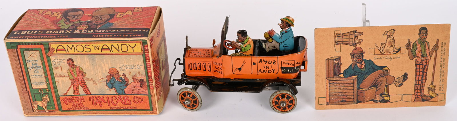 MARX AMOS & ANDY PROMOTIONAL FRESH AIR TAXI w/BOX: Marx tin windup Amos & Andy Promotional Fresh Air Taxi with Autographed Label. In the 1930s Amos & Andy would tour the country at large department stores such as Macy's and Marshall Fields to promote