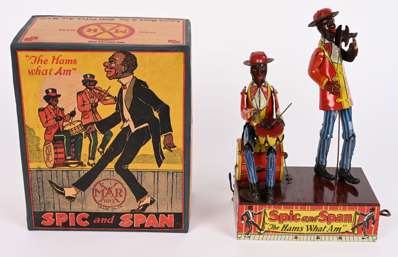 MARX TIN WINDUP "STANDARD" SPIC & SPAN w/ BOX: Marx tin windup Spic and Span Musicians. Standard version with plain colors on the sides of the sitting drum and small drum. Color of the figures hats are red not blue like the deluxe version. All