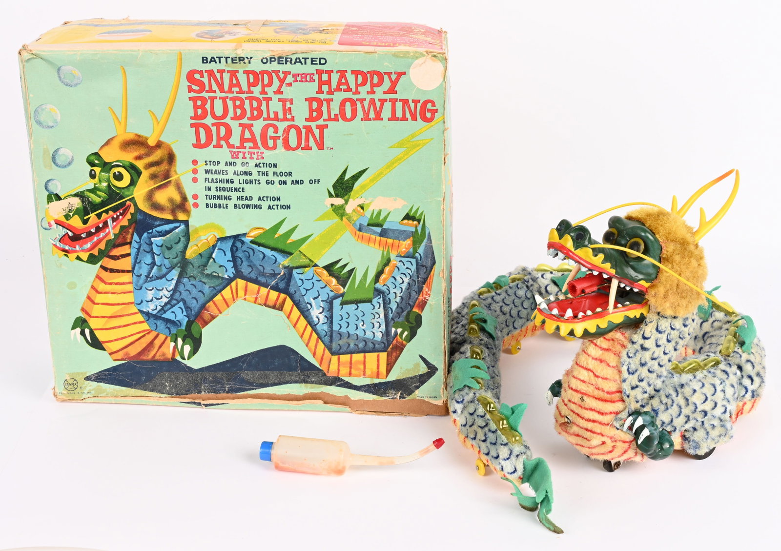 MARX BATTERY OP SNAPPY BUBBLE BLOWING DRAGON wBOX: Marx battery operated Snappy the Happy Bubble Blowing Dragon. All original and in wonderful condition. Toy still has very nice colors. Battery boxes are clean. Did not work when tested. The toy has