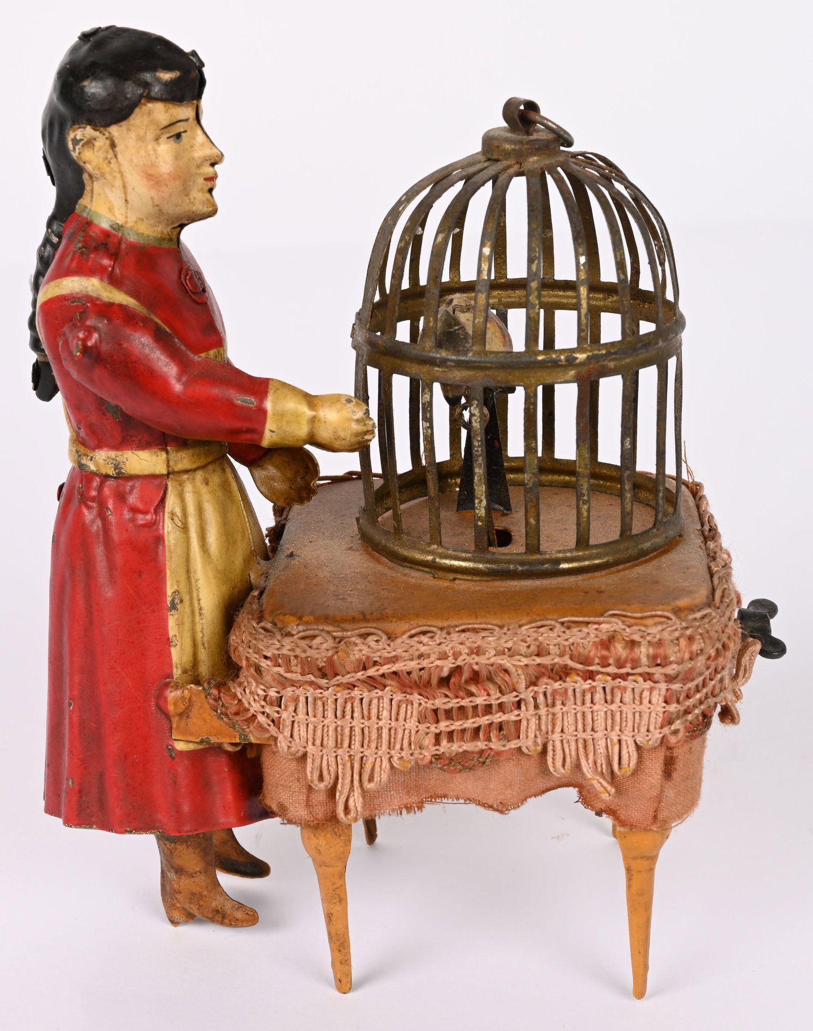 GERMAN HAND PAINTED TIN WINDUP LADY AT BIRD CAGE (1 of 6)