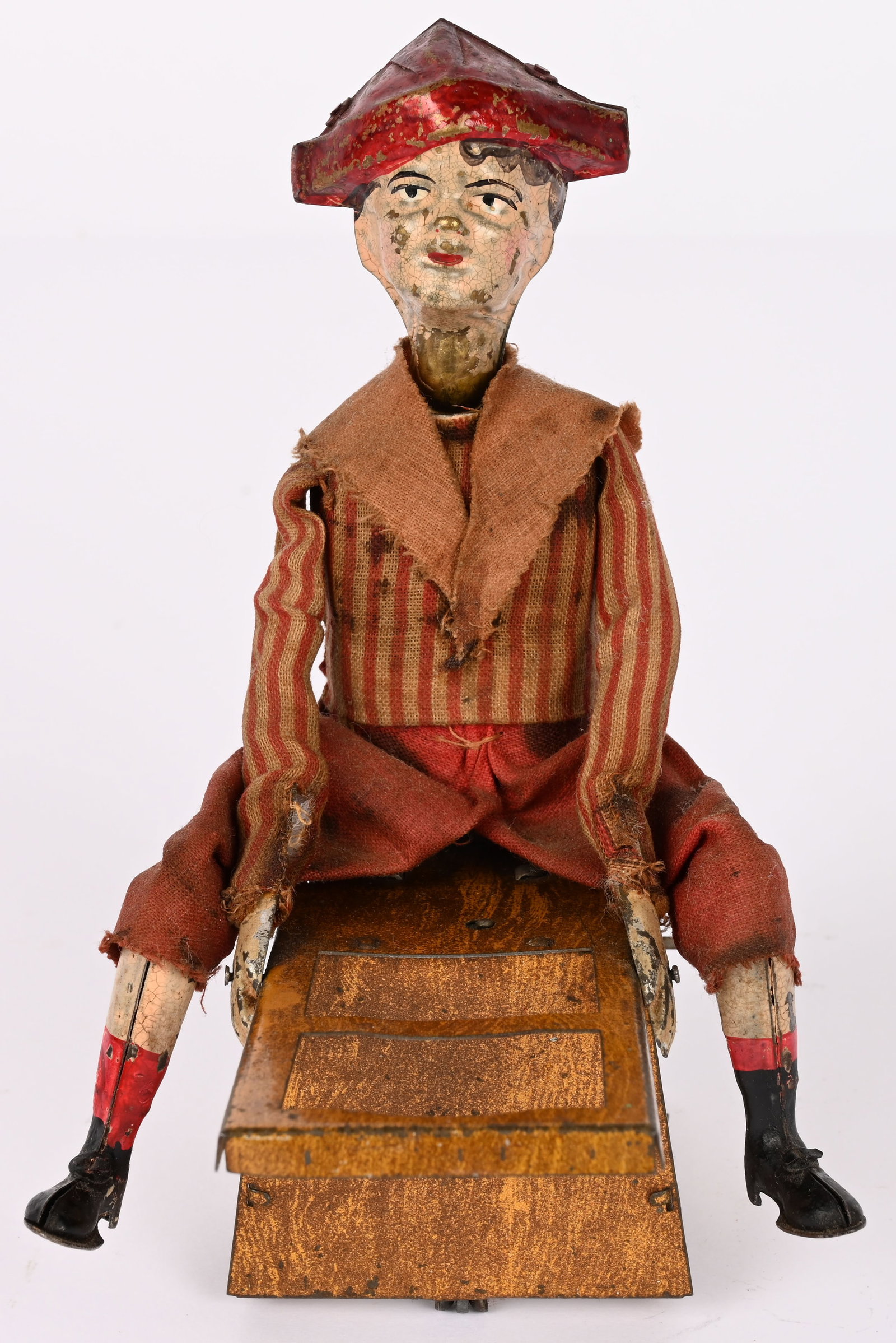 FERDNAND MARTIN WINDUP BOY ON CHAIR: German hand painted windup Boy on Chair. Very nice looking toy. Windup works. Has some minor touchup. 6" Excellent