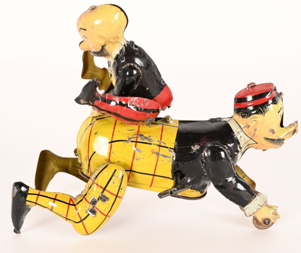 GUNTHERMANN TIN WINDUP MUTT & JEFF: Gunthermann tin windup Mutt and Jeff Toy. Great early character toy. All original and complete. The two characters are crawling around with one on the others back. Very nice colors. Windup works. A ve