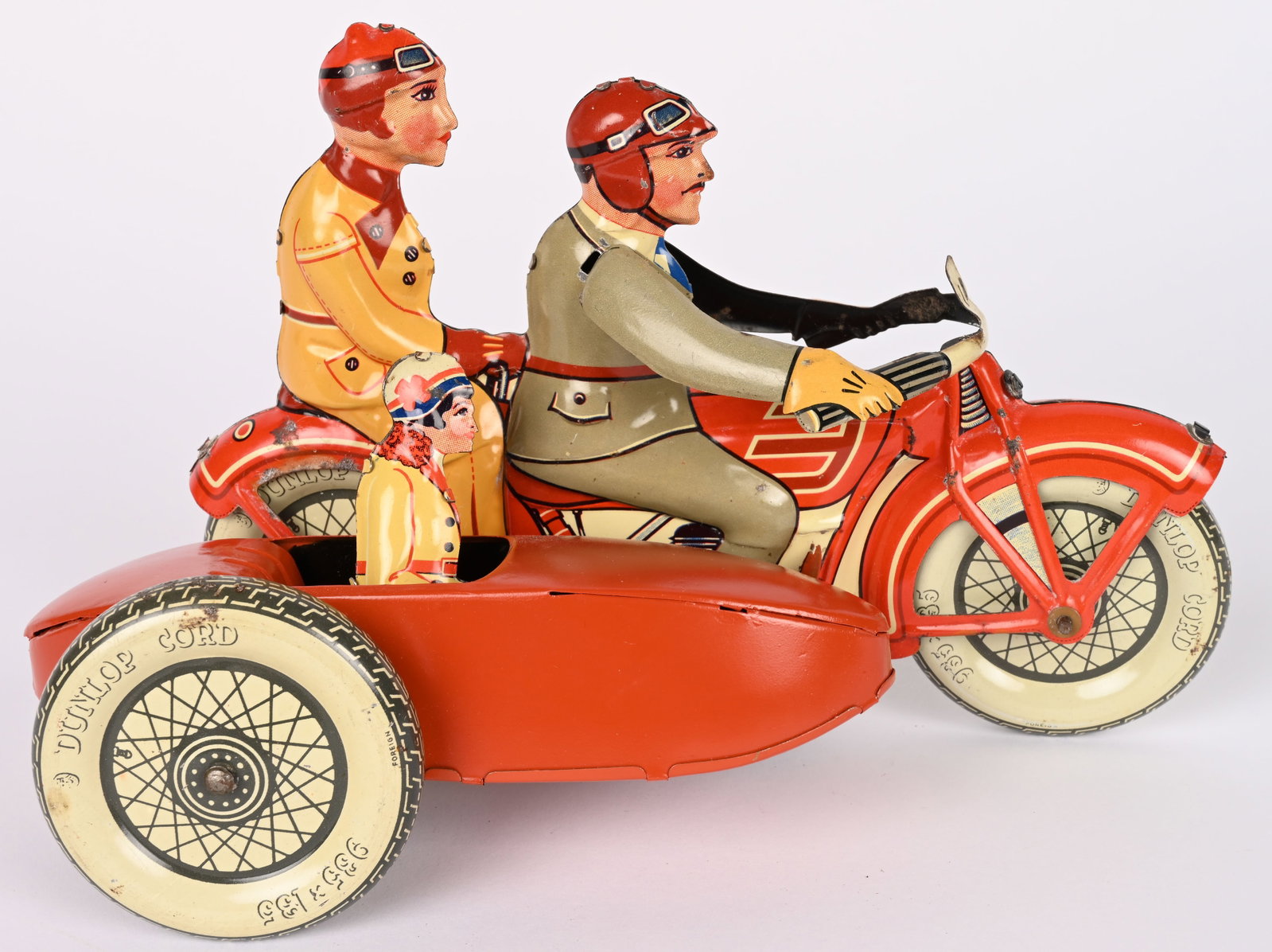 TIPP TIN WINDUP MOTORCYCLE & SIDECAR "LARGE SIZE": Tipp tin windup Motorcycle with Sidecar. Scarce Large Size. Cycle has Man and Woman Riders plus Woman in Sidecar. All original and complete in wonderful condition. Windup works. Sidecar looks to be