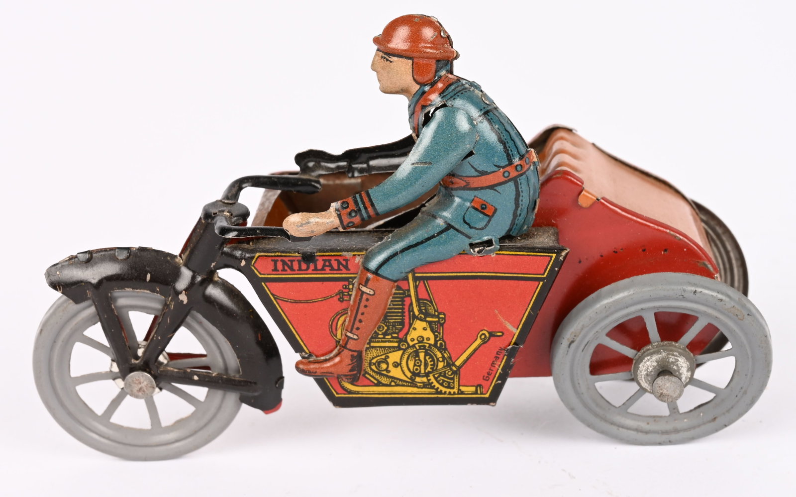 GERMAN TIN INDIAN MOTORCYCLE w/ SIDECAR: RARE German Indian Motorcycle with Sidecar. All original and complete. Marked Indian on Gas Tank. All red and black in color. An early style motorcycle. A very rare toy motorcycle. 5" Excellent