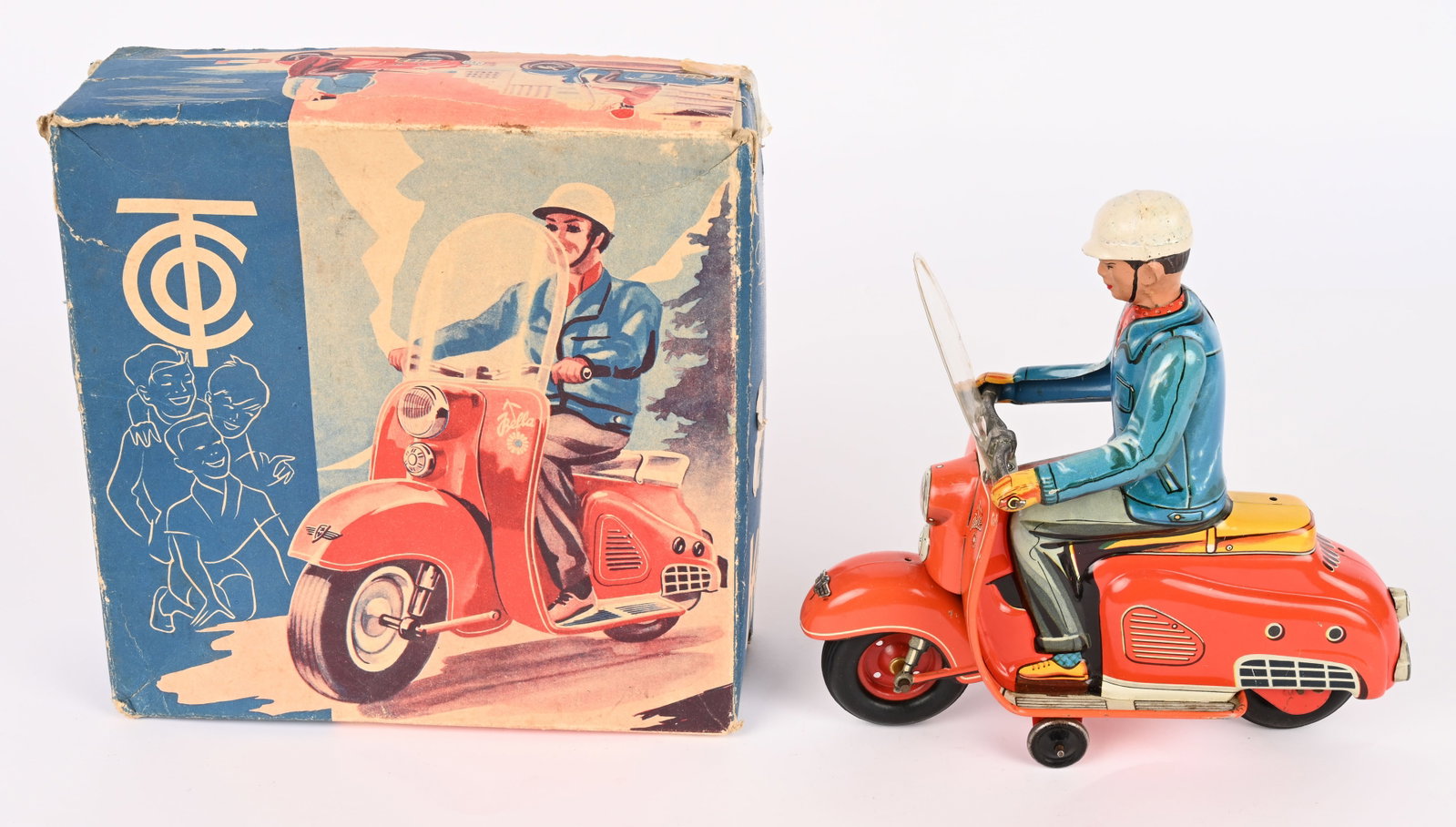 TIPP TIN FRICTION BELLA SCOOTER w/ BOX: German tin friction Bella Scooter. All original tin scooter with composition head rider. Very nice colors. Friction works. Comes with Box. 8 1/2" Excellent