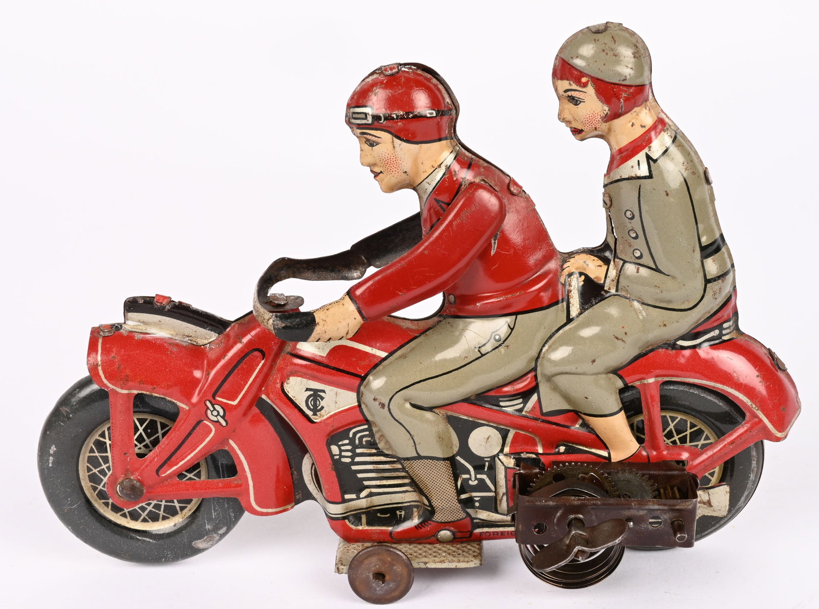 TIPP TIN WINDUP MOTORYCLE w/ 2 RIDERS: German tin windup Motorcycle with Man and Woman Riders. All original in very clean condition. Toy has great details with subtle colors . Windup works. 6 1/2" Excellent