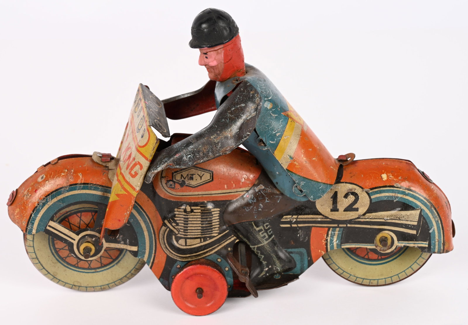METTOY TIN WINDUP SPEED KING MOTORCYCLE: Mettoy tin windup Speed King Motorcycle. All original and complete. Windup works. Colors faded with some wear. 7 1/2" Very Good-Excellent