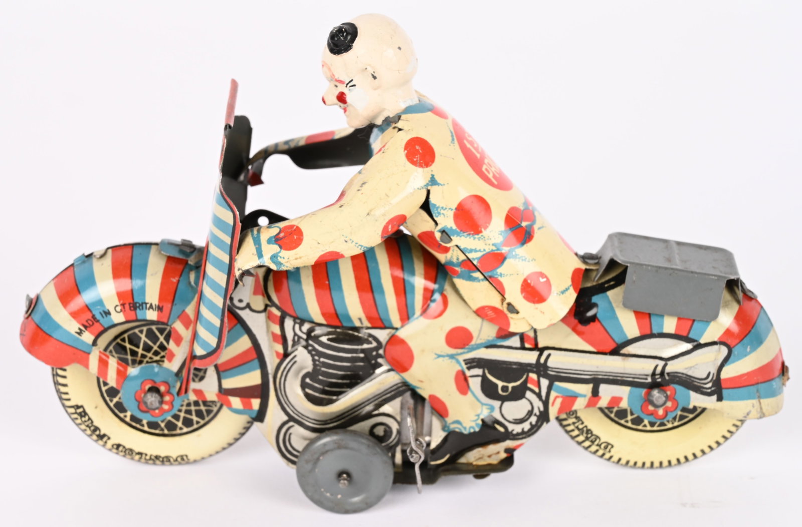 METTOY TIN WINDUP 1ST PRIZE CLOWN MOTORCYCLE: Mettoy tin windup 1st Prize Clown Motorcycle. All original with great colors. Windup works. 7 1/4" Excellent