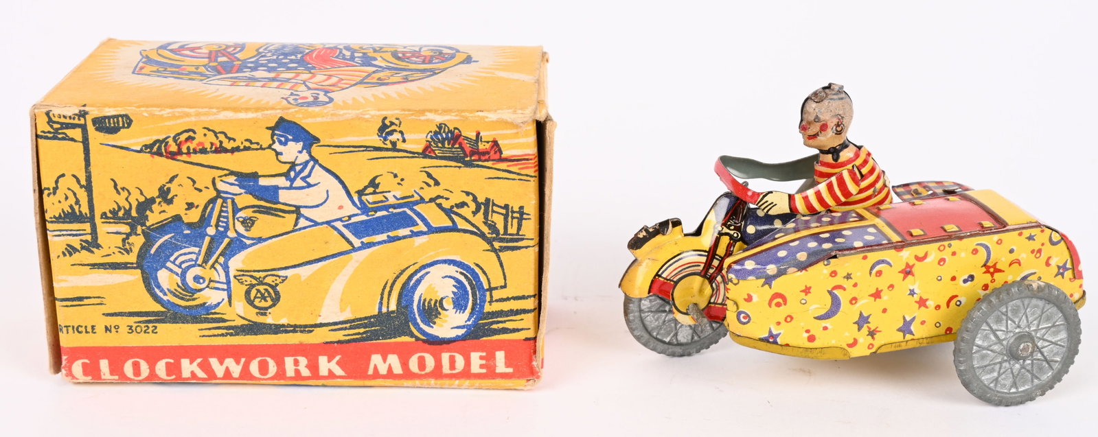 METTOY TIN WINDUP CLOWN ON MOTORCYCLE w/ BOX: Great Britain tin windup Clown on Motorcycle with Sidecar. All original and complete with great colors. Has diecast wheels. No key to test windup mech. 3 1/4" Excellent