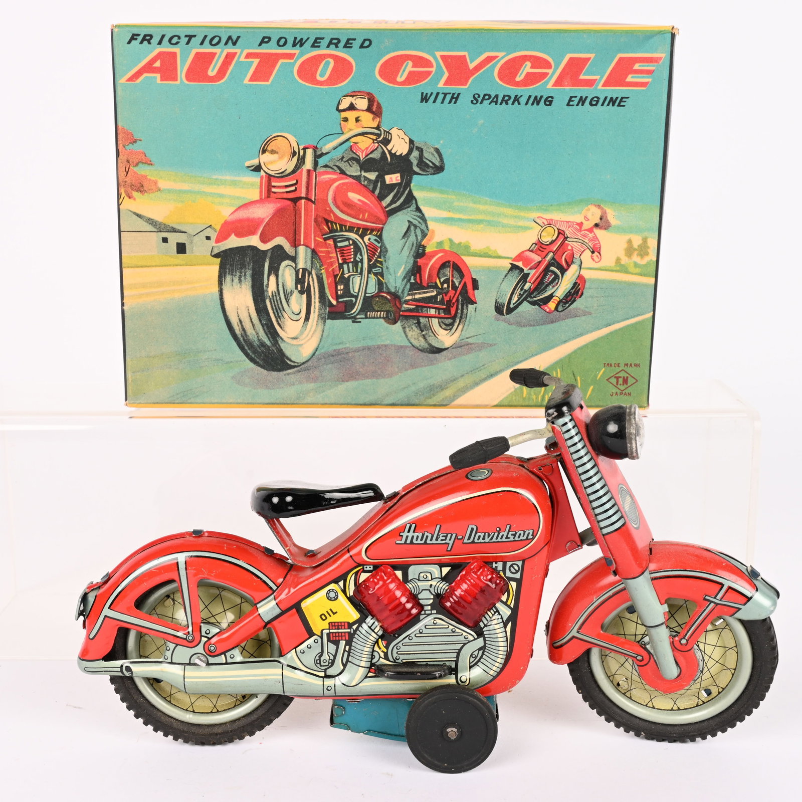 JAPAN FRICTION AUTO CYCLE HARLEY DAVIDSON w/ BOX: Japan tin friction Harley Davidson Motorcycle. Red version. All original and looks never played with. Friction works. Boxed 8" Excellent