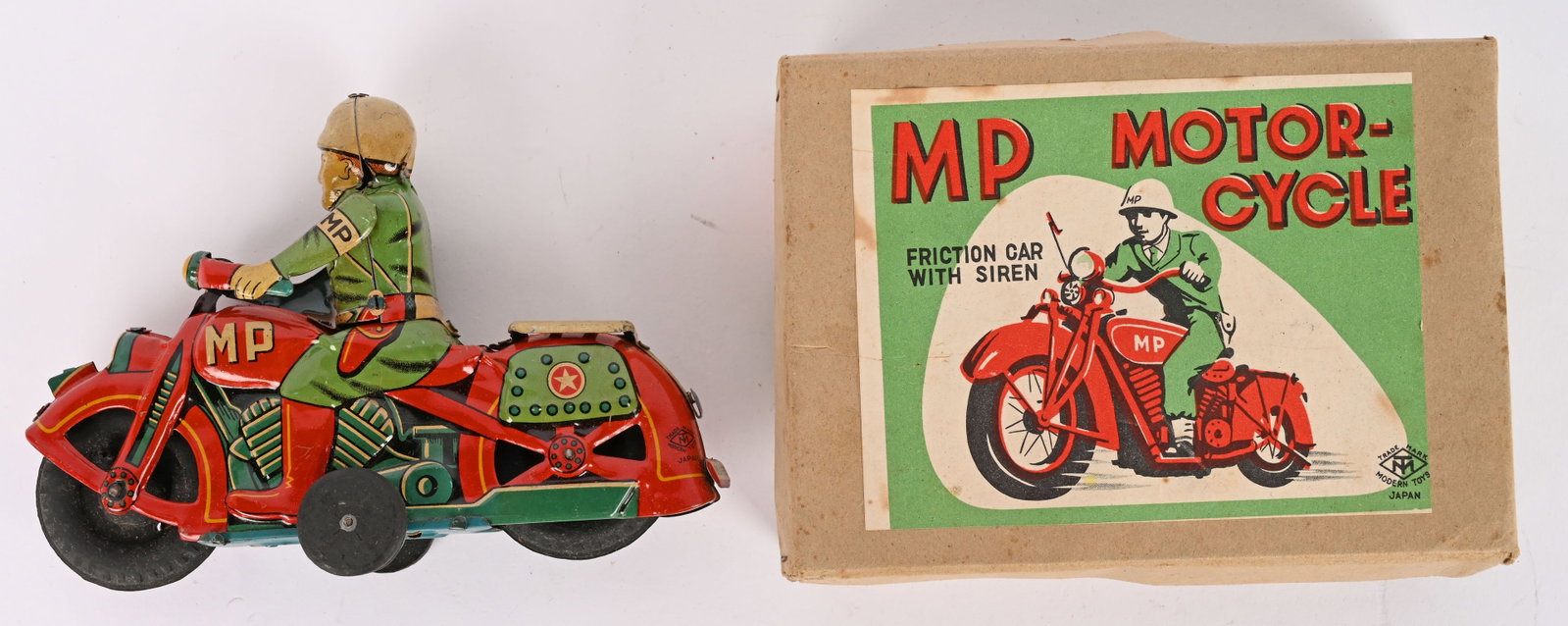 JAPAN TIN FRICTION MP MOTORCYCLE w/ BOX: Japan tin friction MP Motorcycle. All original and looks never played with condition. Friction works. With Box. 7" Excellent