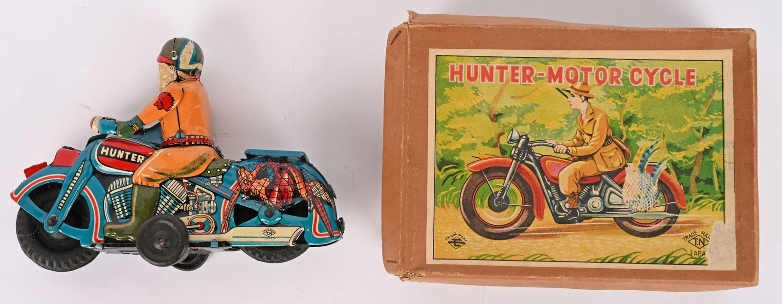 JAPAN TIN FRICTION HUNTER MOTORCYCLE w/ BOX: Japan tin friction Hunter Motorcycle. All original and looks never played with. Very nice colors with fowl in the net on back. Friction works. With Box. 4 1/2" Excellent