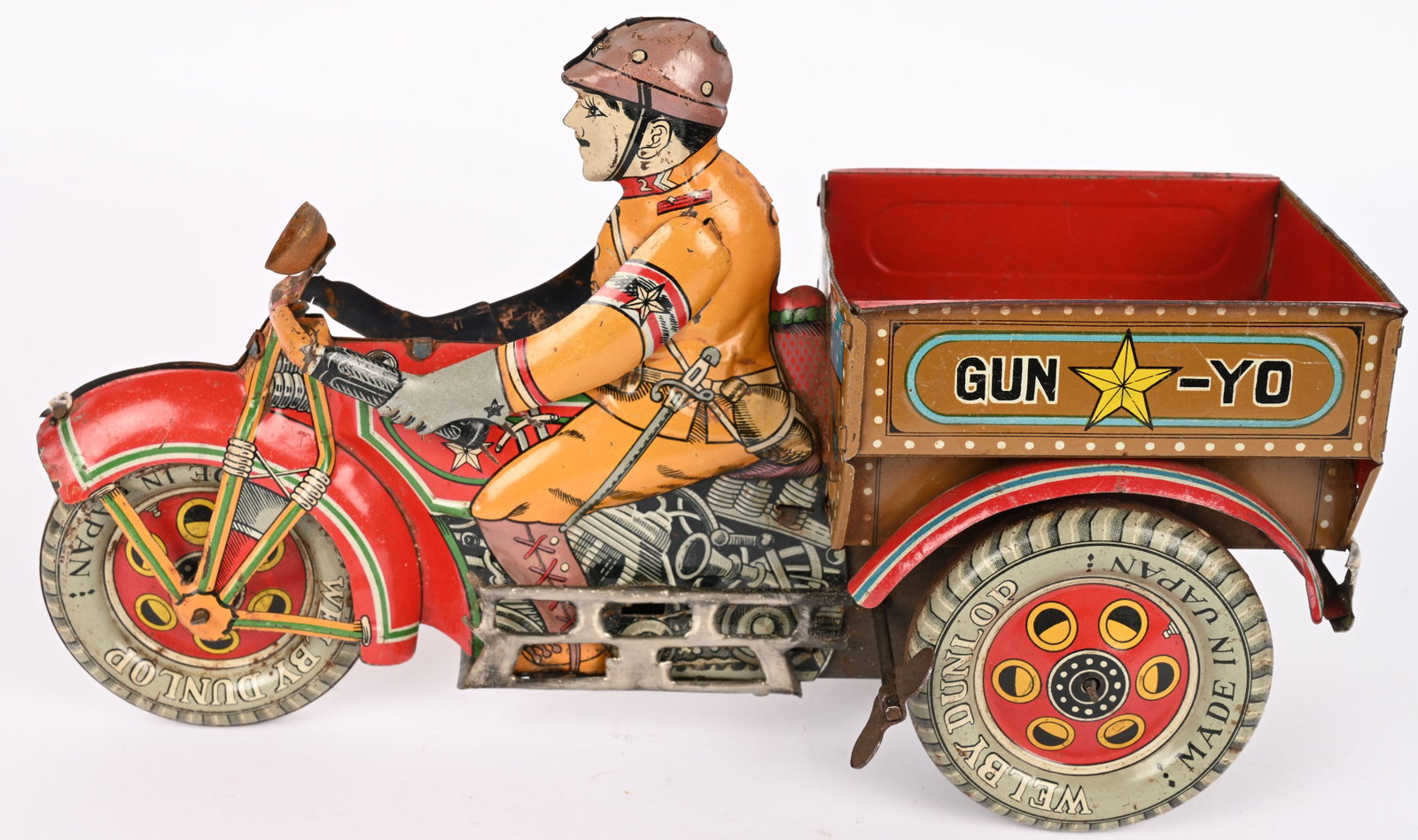 PRE-WAR JAPAN TIN WINDUP GUN-YO TRIKE MOTORCYCLE: RARE Pre-War Japan tin windup Gun-Yo Military Trike Motorcycle. Toy has great details. Has Japanese Soldier with Gun and Dagger rider. Windup works. Foot guard on bottom replaced and there is a tab mi