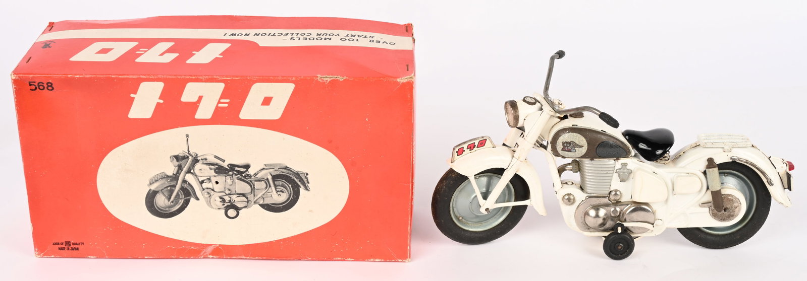JAPAN TIN FRICTION MEGURO MOTORCYCLE w/ BOX: Japan tin friction Meguro 500cc Motorcycle. All original and complete. One of the rubber foot peg is half gone. Has very nice details. Comes with Box. 11" Excellent